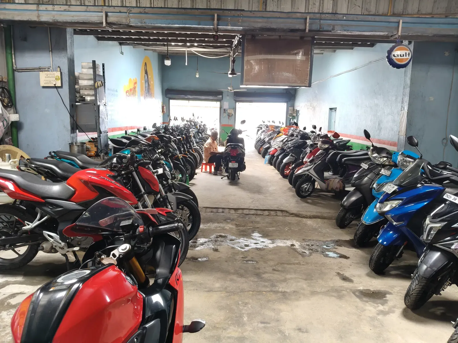 Inside the showroom, bikes on both sides of the walkway