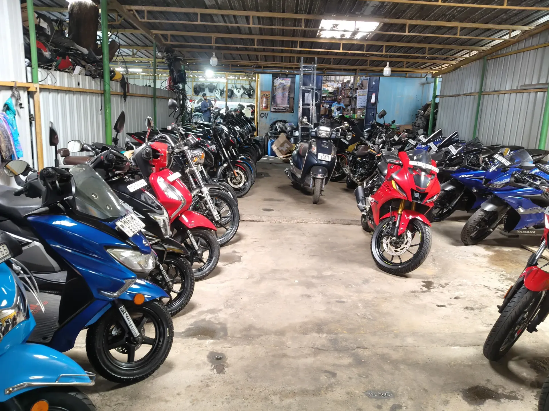 Sports bikes and scooters on the showroom floor