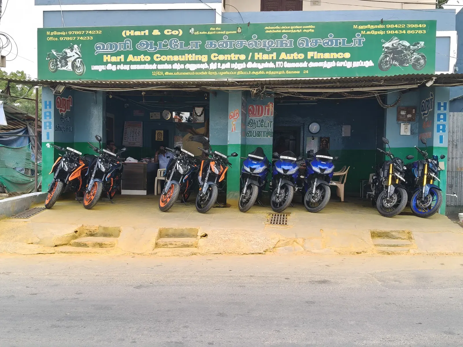 HARI AUTO showroom front with bikes lined up at the entrance